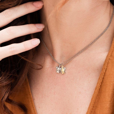 COLLANA CON PENDENTE ANGELO IN ORO BIANCO E DIAMANTI